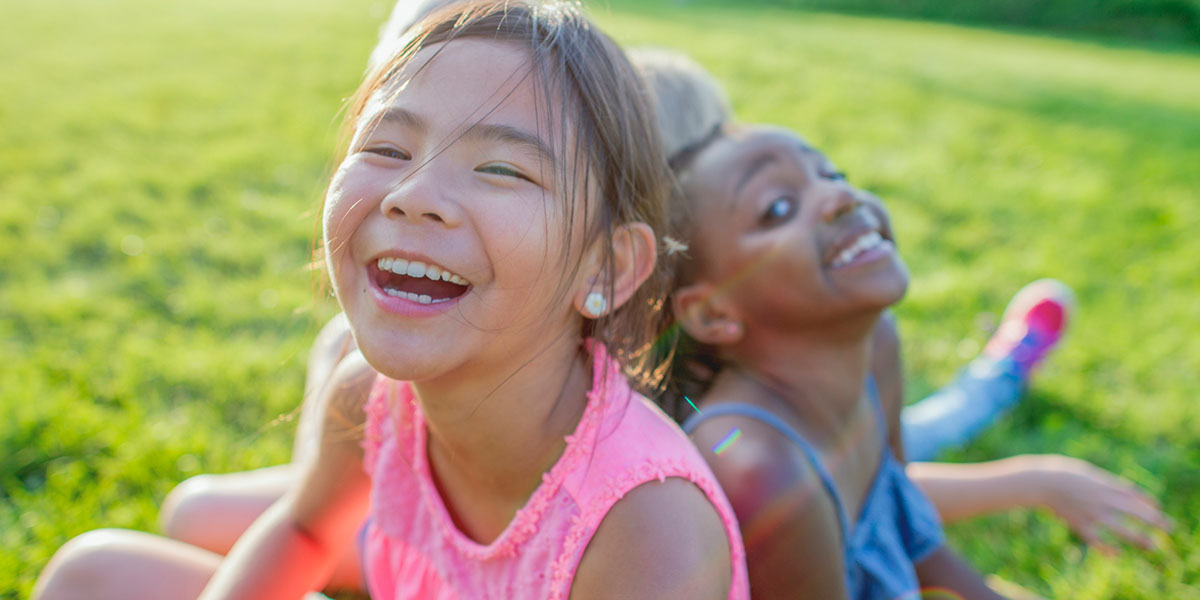 Girls play outside