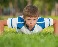 Kid doing push ups