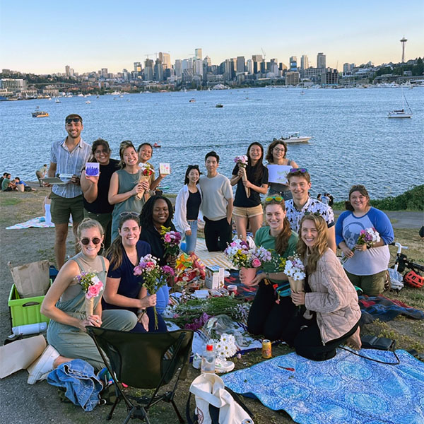 Residents enjoy building community together with the backdrop of beautiful Lake Union.