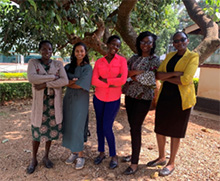 Doctors in front of a tree