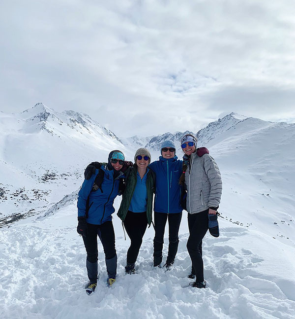 Residents standing on a snowy mountain