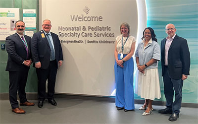 Dr. Ettore Pallazo, MD, FACP, EvergreenHealth CEO; Chris Bredeson, MBA, FACHE, EvergreenHealth COO; Tessi Foley, MN, RN, EvergreenHealth Director, Women and Children’s Services; Jamie Phillips, MHA, FACHE, Seattle Children’s President and COO; Howard Jeffries, Seattle Children’s Senior Medical Director, Regional Network Strategy and Development