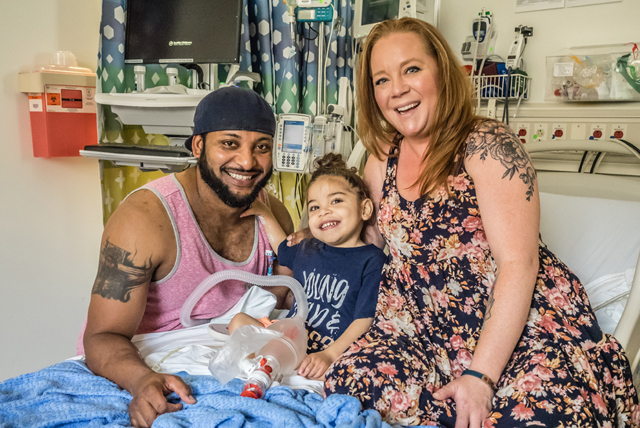 Family at kid's hospital bed