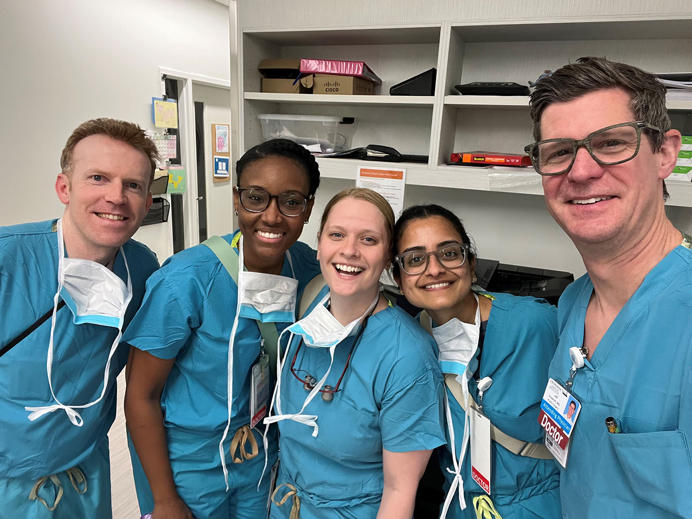 Surgeons pose for a picture.