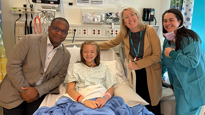 Dr. André Dick with transplant recipient, Mary.