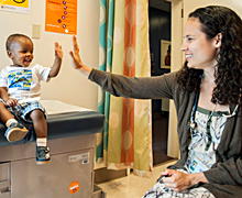 Doctor high-fiving patient