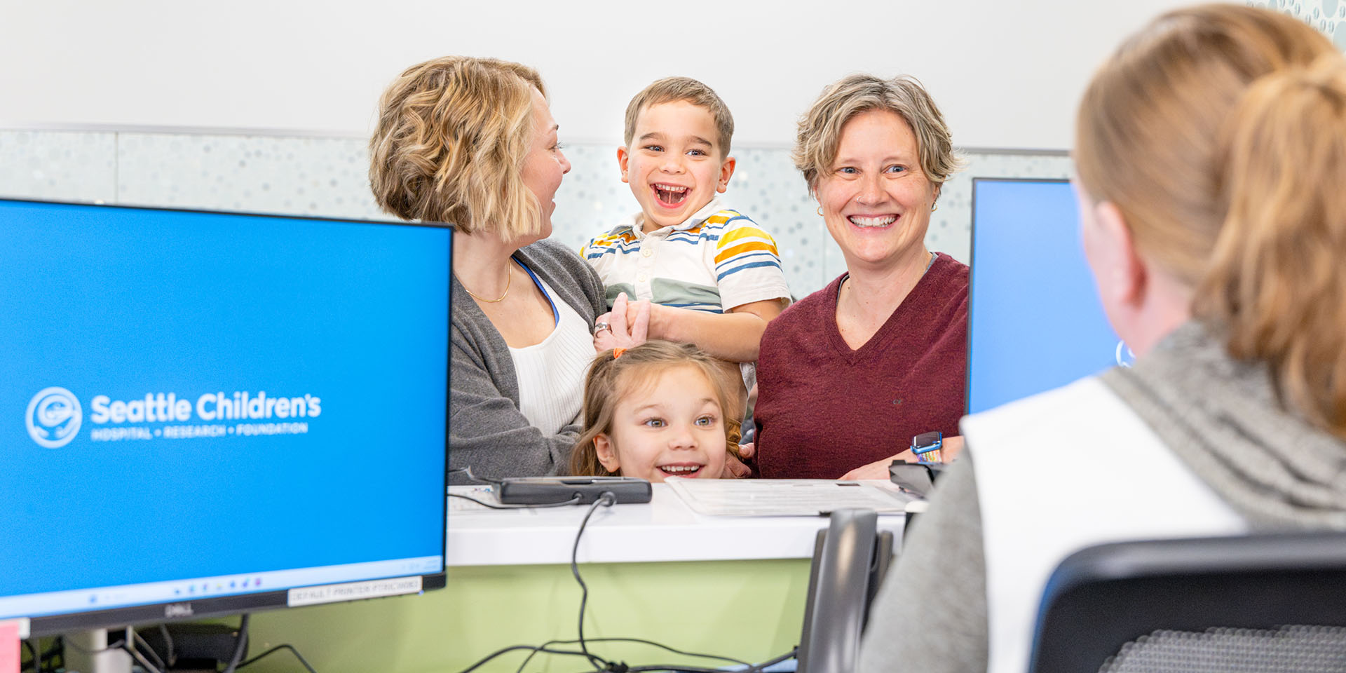 Family checks in at Richmond Pediatrics for a visit.