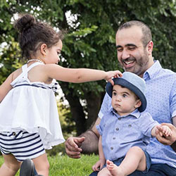 A family plays in a park