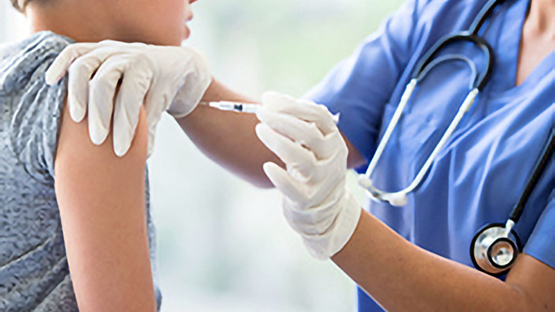 Provider vaccinating patient