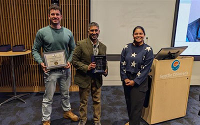 Researcher accepting an award