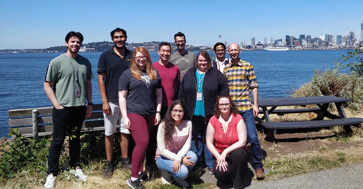 Members of the Grill Lab Pose with Seattle in the background