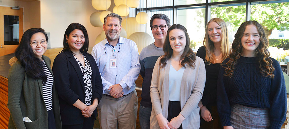 Members of the Debley Lab pose for a photo