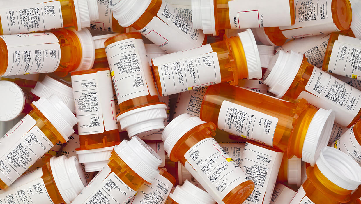 A pile of medication bottles