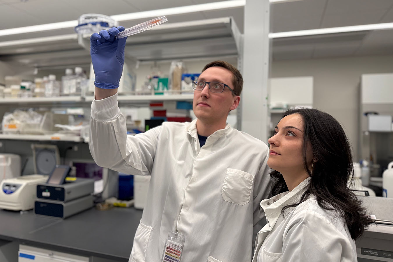 Aidan Laird, a research scientist in a Seattle Children’s Research Institute lab