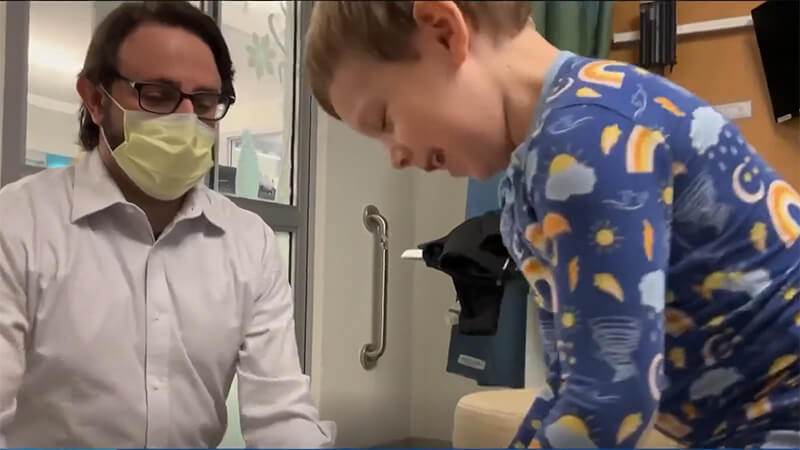 Dr. Vitanza and patient