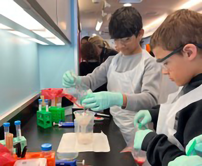 Students running an experiment