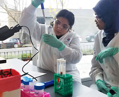 Students running an experiment
