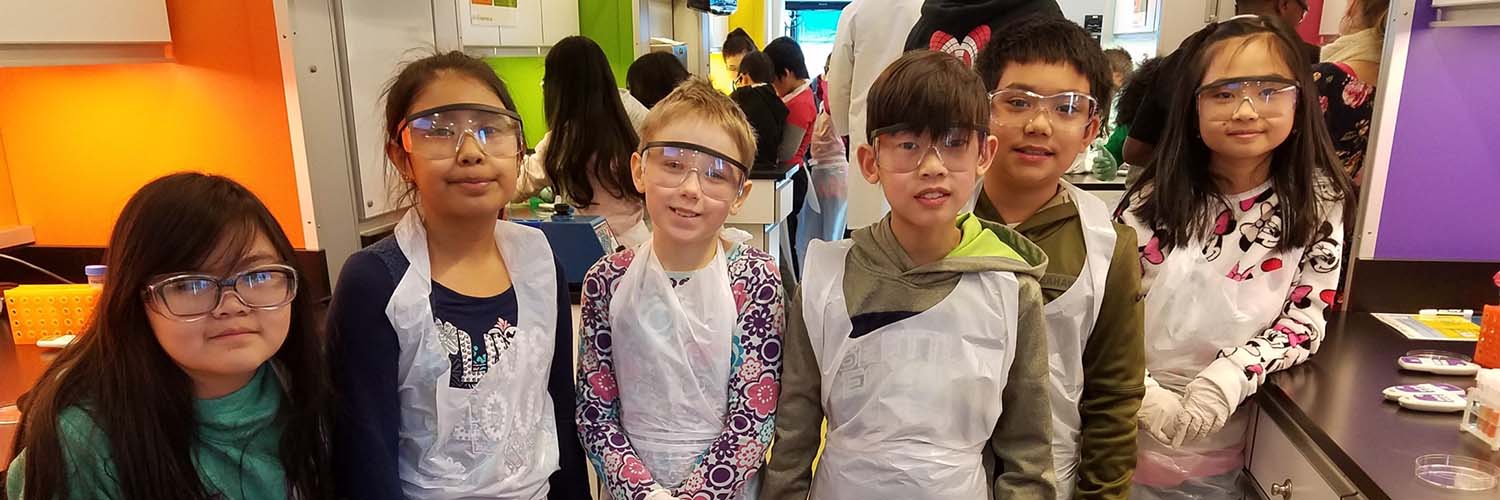 Elementary school students onboard the mobile Science Adventure Lab